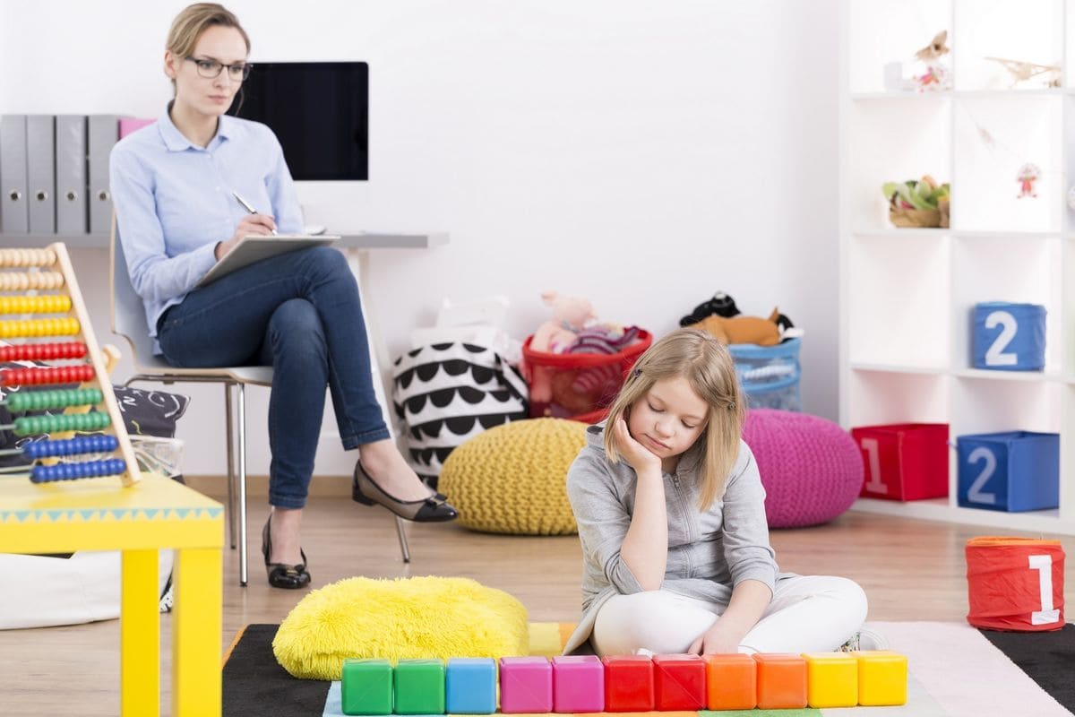 Child engaging in sensory play to support sensory processing and regulation