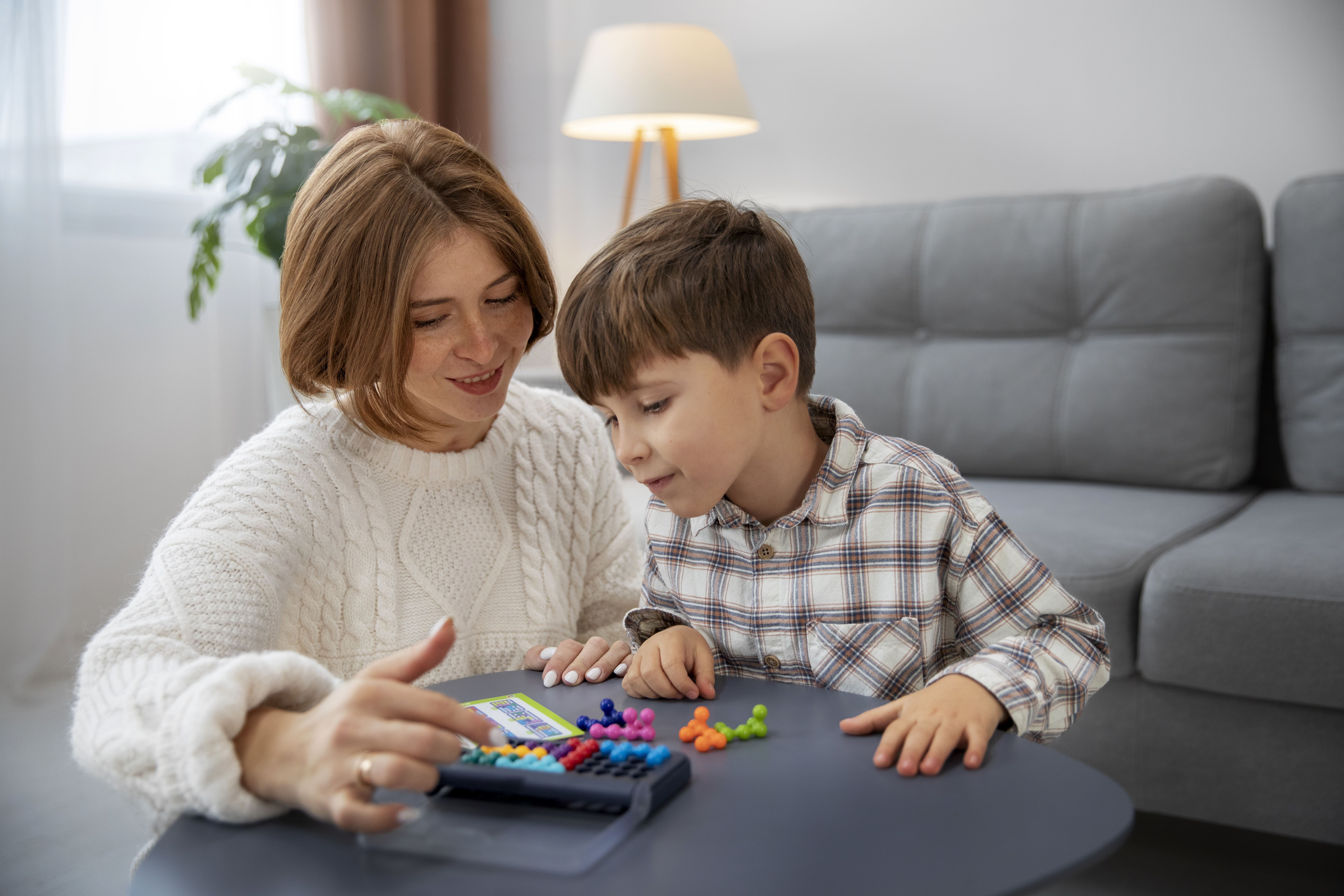 Child with autism receiving early intervention therapy, showing speech therapy and developmental support